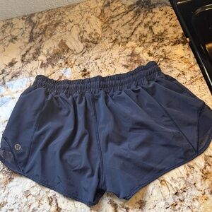 LULULEMON size 6 navy shorts .